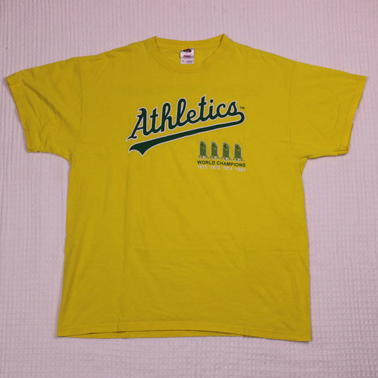 Vintage Y2K - Fruit of the Loom - Yellow Oakland Athletics World Champions Graphic T-shirt - Size XL